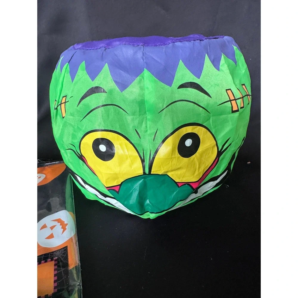Halloween Frankenstein Pop Up Candy Bucket and 60 Inch Round Vinyl Tablecloth